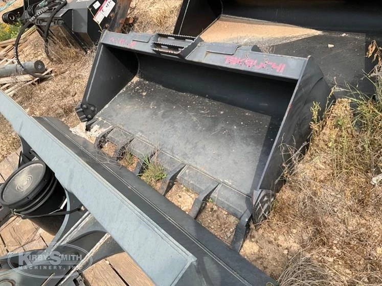 Front of used Takeuchi Bucket